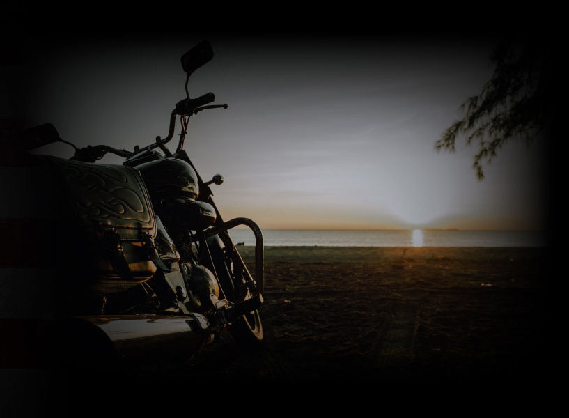 Motorcycle at sunrise in a faded frame